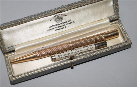 A late 1920s engine turned 9ct gold pencil.